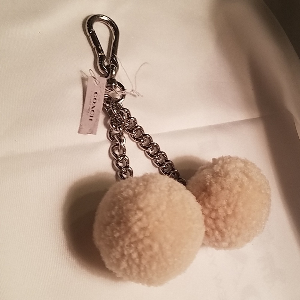 Coach Beige Pom Pom Keychain with Silver Hardware